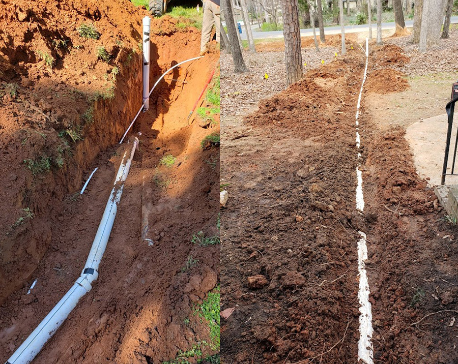 Sewer line repair trench with exposed underground pipe by Pathmaker Plumbing in Charlotte, NC.